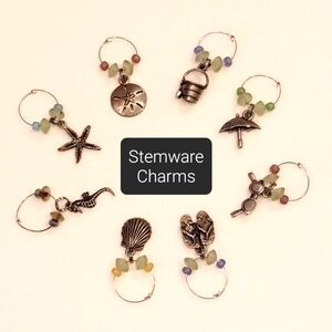 8 Antiqued Pewter Charms beach theme lead-free from Fire Mountain Gems